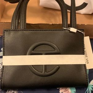 small black telfar bag